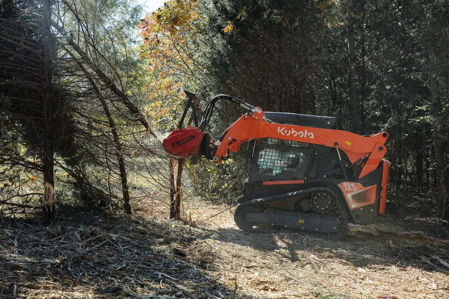 Kubota clearing trees